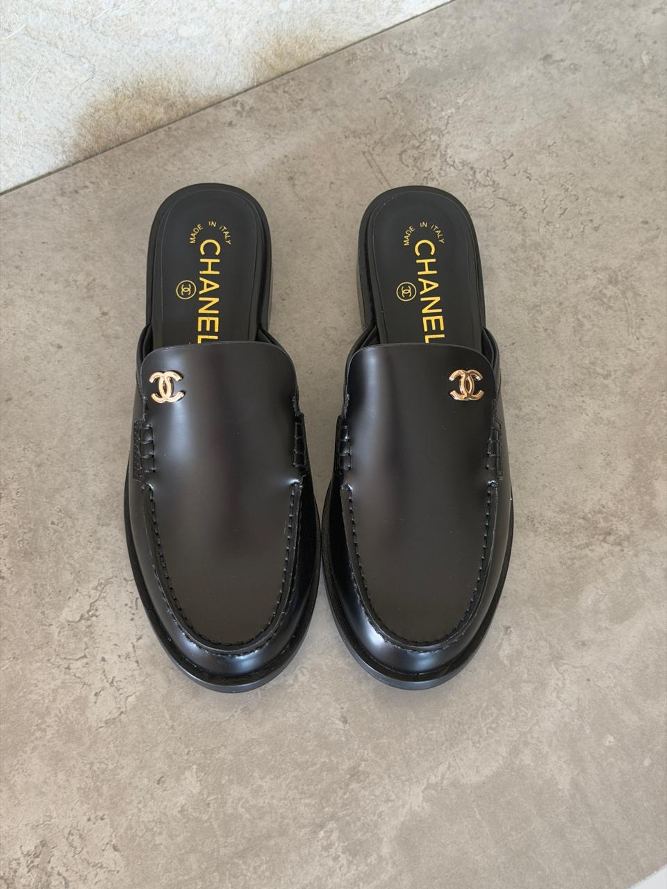 Chanel Mules in Black leather