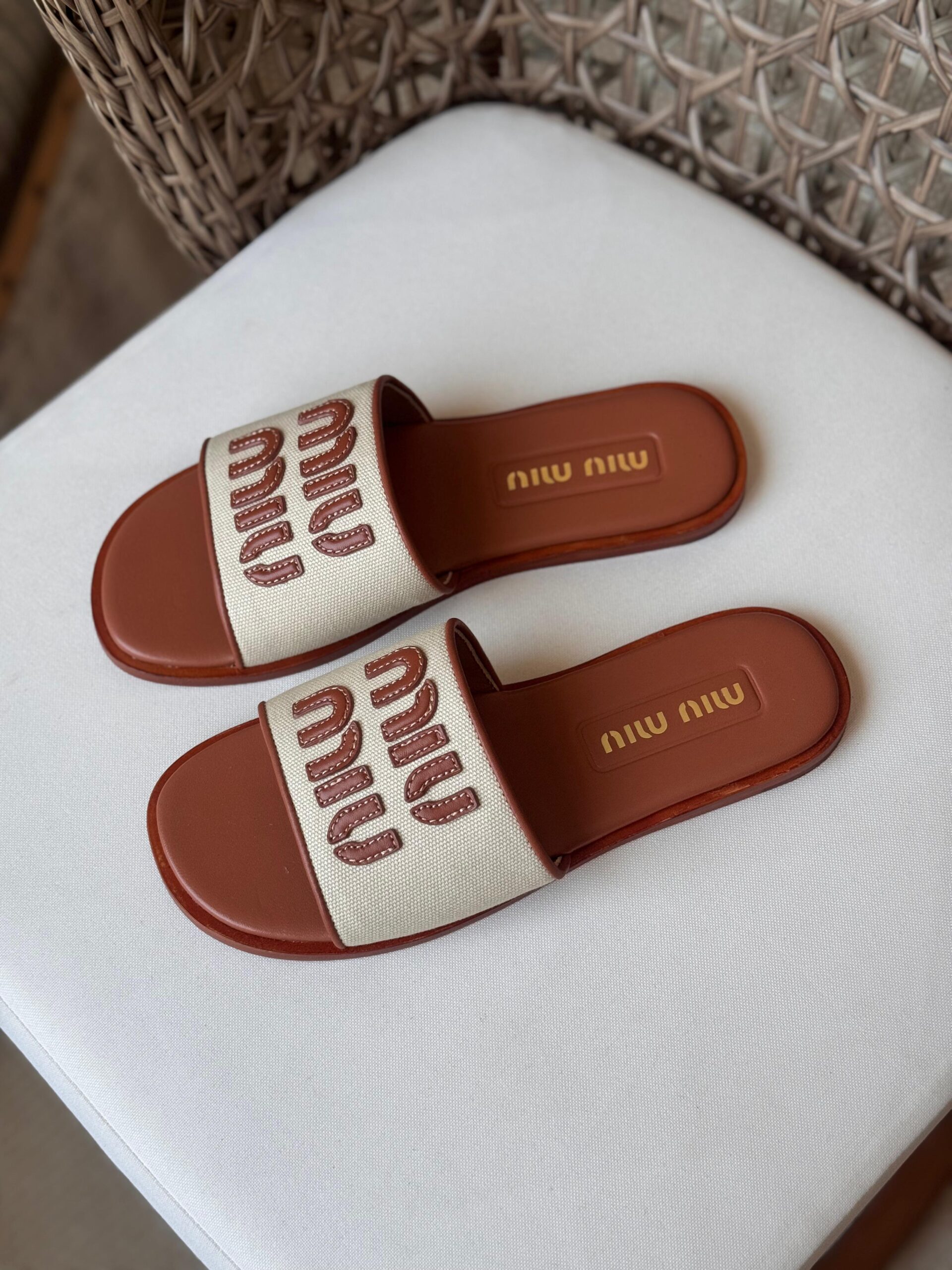 Miu Miu Canvas and leather slide sandals